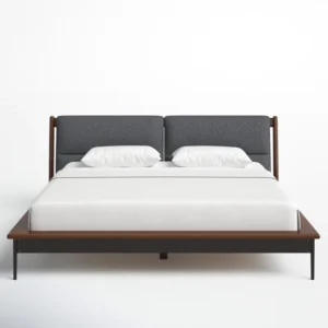 تخت خواب مدل باران AVI-BE014 دو نفره مدرن؛ ترکیب زیبایی، راحتی و کیفیت در یک طراحی شیک اگر به دنبال یک تخت خواب دو نفره مدرن، مقاوم و هماهنگ با دکوراسیون داخلی خود هستید، این محصول انتخابی ایده‌آل برای شماست! طراحی جذاب این تخت خواب با ترکیب قاب چوبی با رنگ قهوه‌ای تیره و پشتی پارچه‌ای خاکستری، ظاهری لوکس و مدرن به اتاق خواب شما می‌بخشد. چرا این تخت خواب گزینه‌ای عالی است؟ ✔ طراحی مدرن و شیک با خطوط ساده و مینیمالیستی، این تخت خواب نمایی جذاب به اتاق خواب می‌دهد و با هر سبک دکوراسیونی هماهنگ می‌شود. ترکیب چوب و پارچه، حس گرما و لطافت را در محیط ایجاد می‌کند. ✔ استحکام و دوام بالا استفاده از متریال باکیفیت در ساخت این تخت خواب، دوام و مقاومت آن را تضمین می‌کند. قاب چوبی مستحکم همراه با پایه‌های مقاوم، پایداری فوق‌العاده‌ای فراهم می‌آورد. ✔ راحتی بی‌نظیر پشتی پارچه‌ای نرم و لطیف این تخت خواب، راحتی بیشتری برای شما هنگام استراحت و مطالعه فراهم می‌کند. همچنین تشک استاندارد آن باعث خواب عمیق و آرام می‌شود. ✔ ابعاد مناسب برای فضاهای مختلف این تخت خواب دو نفره، با ابعاد استاندارد طراحی شده است تا هم در فضاهای کوچک و هم در اتاق‌های بزرگ قابل استفاده باشد. چگونه این تخت خواب به دکوراسیون شما جلوه‌ای خاص می‌بخشد؟ ترکیب رنگ‌های قهوه‌ای تیره و خاکستری، حسی مدرن و لوکس به اتاق خواب شما می‌دهد و به راحتی با سایر وسایل دکوراتیو مثل میز کنار تخت، پرده‌ها و فرش‌ها هماهنگ می‌شود. این تخت خواب دو نفره نه تنها از نظر زیبایی و کیفیت برجسته است، همین حالا سفارش دهید و اتاق خواب خود را با این تخت خواب مدرن، شیک و راحت ارتقا دهید!