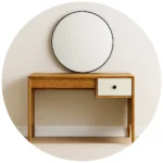 میز آرایش آویسا AVI-DRT064 مینیمال چوبی با کشو سفید و آینه گرد میز آرایش مینیمال انتخابی بینقص برای کسانی است که به دنبال ترکیب زیبایی، سادگی و عملکرد در فضای شخصی خود هستند. این میز با طراحی مدرن و خطوط تمیز، بهراحتی با دکوراسیونهای مینیمال، اسکاندیناوی یا مدرن هماهنگ میشود. سطح چوبی طبیعی در کنار کشوی سفید با دستگیره مشکی، جلوهای متعادل و چشمنواز ایجاد کرده است. آینه گرد با قاب مشکی بالای میز، حس ظرافت و انسجام را به فضا منتقل میکند و تجربه آرایش روزانه را دلپذیرتر میسازد. ویژگیهای طراحی میز آرایش مینیمال میز آرایش آویسا AVI-DRT064 مینیمال مدرن با آینه گرد و کشو سفید طراحی مینیمال با خطوط صاف و پایههای مخروطی سطح چوبی مقاوم مناسب برای لوازم آرایشی، عطر و اکسسوری کشوی سفید با دستگیره مشکی برای نظمدهی به وسایل کوچک آینه گرد با قاب مشکی برای جلوه بصری خاص و کاربردی رنگ طبیعی چوب با تضاد سفید و مشکی برای زیبایی بیشتر مشخصات فنی میز آرایش مینیمال میز آرایش آویسا AVI-DRT064 چوبی با کشو سفید برای اتاق خواب یا راهرو این میز آرایش مینیمال از MDF با روکش چوب طبیعی ساخته شده و ساختاری مقاوم برای استفاده روزانه دارد. کشوی سفید فضای کافی برای نگهداری لوازم آرایشی، جواهرات یا وسایل شخصی فراهم میکند. آینه گرد با قاب مشکی، علاوه بر زیبایی، کاربردی بوده و برای آرایش، مراقبت پوست یا استایل روزانه بسیار مناسب است. ابعاد میز به گونهای طراحی شده که در فضاهای کوچک نیز قابل استفاده باشد، بدون آنکه از زیبایی یا کارایی آن کاسته شود. چرا میز آرایش مینیمال بهترین انتخاب است؟ میزآرایش ساده و کاربردی برای دکوراسیون مدرن مناسب برای اتاق خواب، راهرو یا فضای شخصی طراحی جمعوجور برای فضاهای محدود هماهنگی با سبکهای مدرن، مینیمال و اسکاندیناوی نصب آسان و ساختار مقاوم ایجاد محیطی منظم، آرام و الهامبخش برای مراقبت شخصی